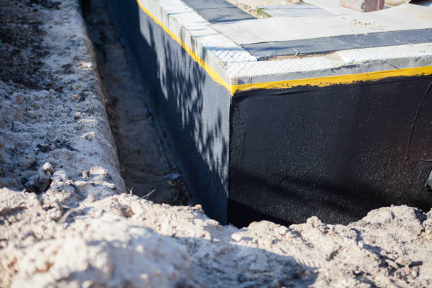 Professional Waterproofing technician working in Boaz, AL